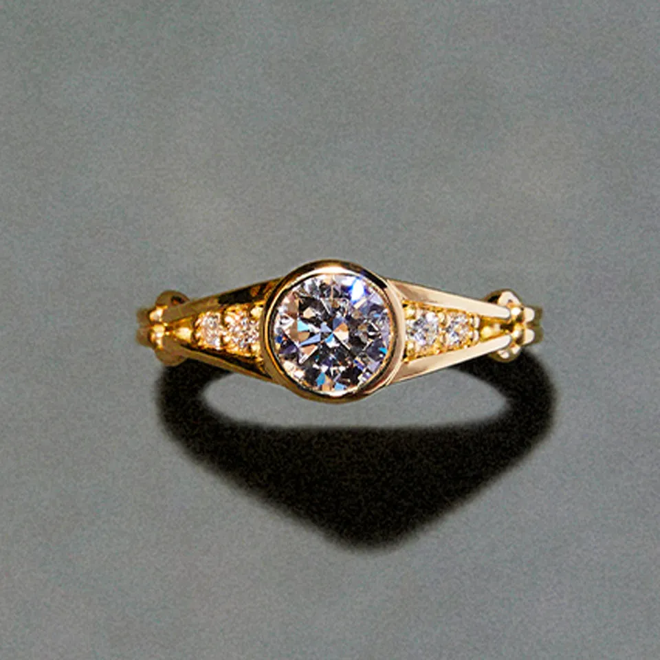 Bezel Set Brilliant Cut Ring with Double Ridged Band