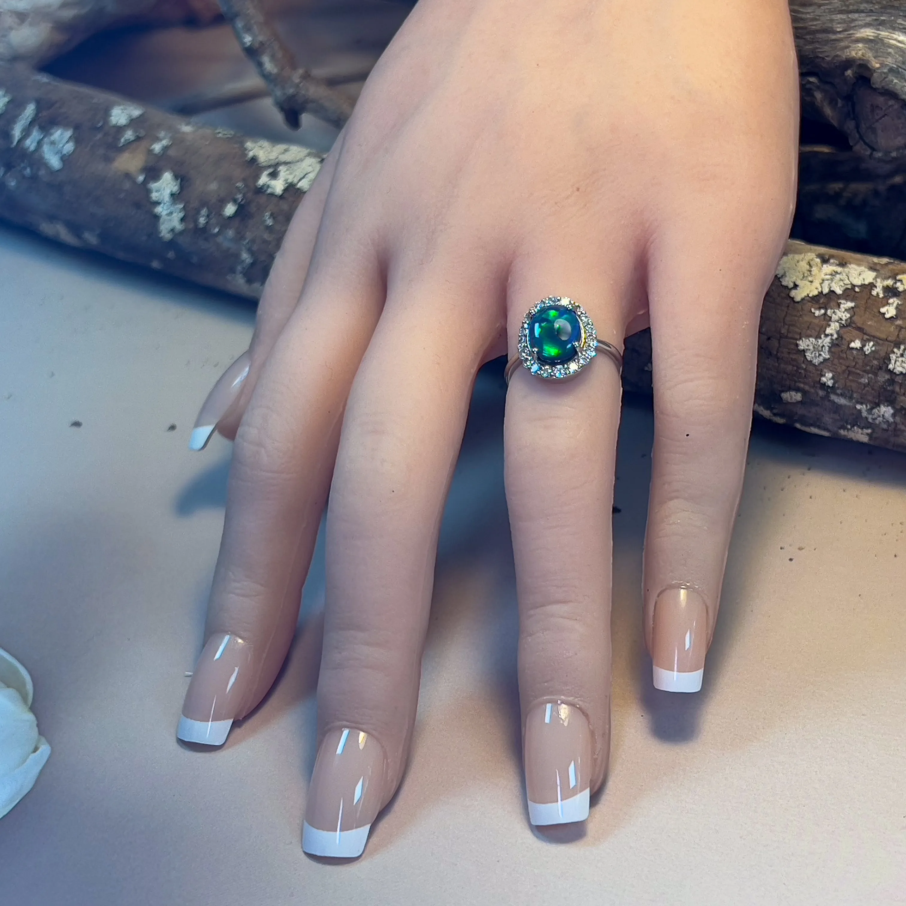 Platinum halo Black Opal 1.92ct Diamond ring